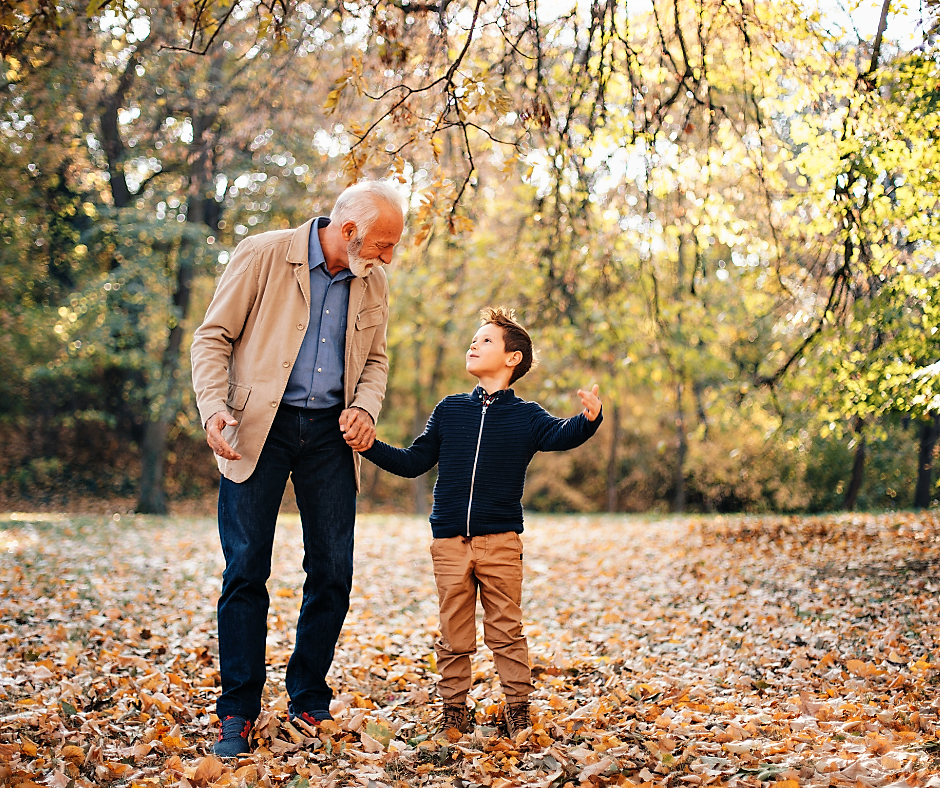 Older man sharing time with grandchild
